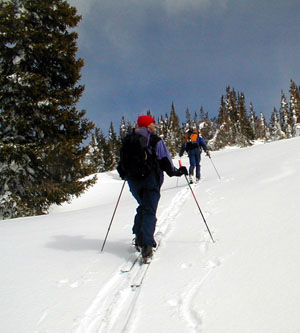 Glenn leads Martin Meyer up Rendezvous Mountain