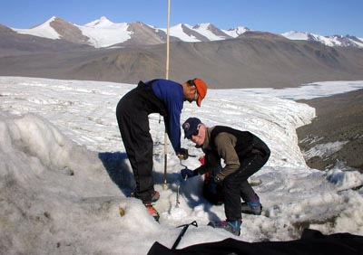 Paul "hoss" Doherty powers the ice auger.