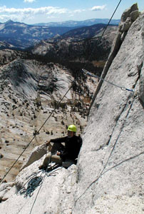 Paul Morgan on a ledge above the chimney pitch