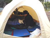 Morresa waits out the storm in a tent.