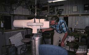Duane Hammon aiming his laser telescope
