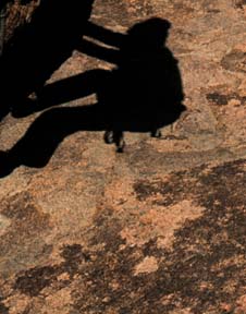 Paul doherty on an overhang at Joshua Tree © 1999