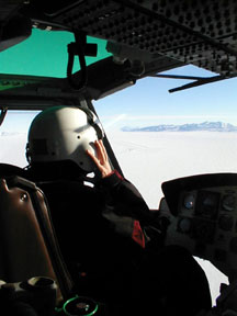 Black Island out the front window of a huey.