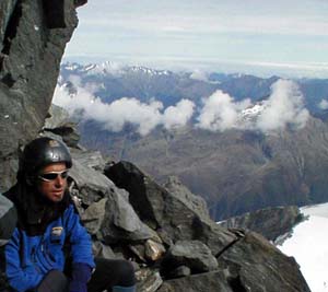 Bryan at the belay on rock elow the ramp on Mt Aspiring.