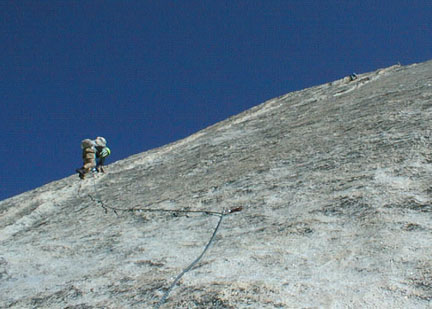 Paul leads across the crux to the dike