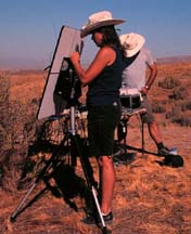 Sabrina and jason aim the INMARSAT antenna.