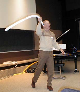 Paul plays the swimming pool vacuum hose whirly