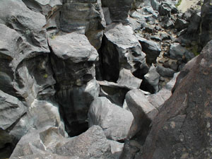 potholes in the canyon of fossil falls CA