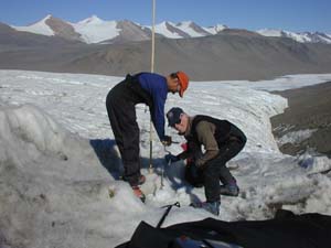 Paul Doherty drilling on the Commonwealth glacier