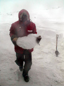 Anchoring the tents in an Antarctic storm.