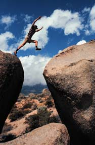 Paul gets some air, the Buttermilk Boulders CA