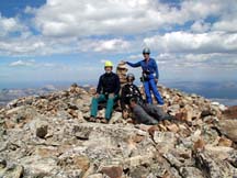 Paul, Martin, and Morresa on the summit of Moran