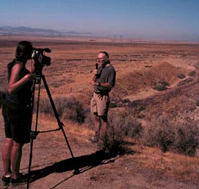 Sabrina webcasts Paul in front of Wallace Ceek.