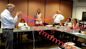 John Lahr demonstrates earthquake waves on slinkies